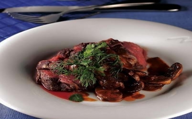 Roastbeef con salsa de ajo asado